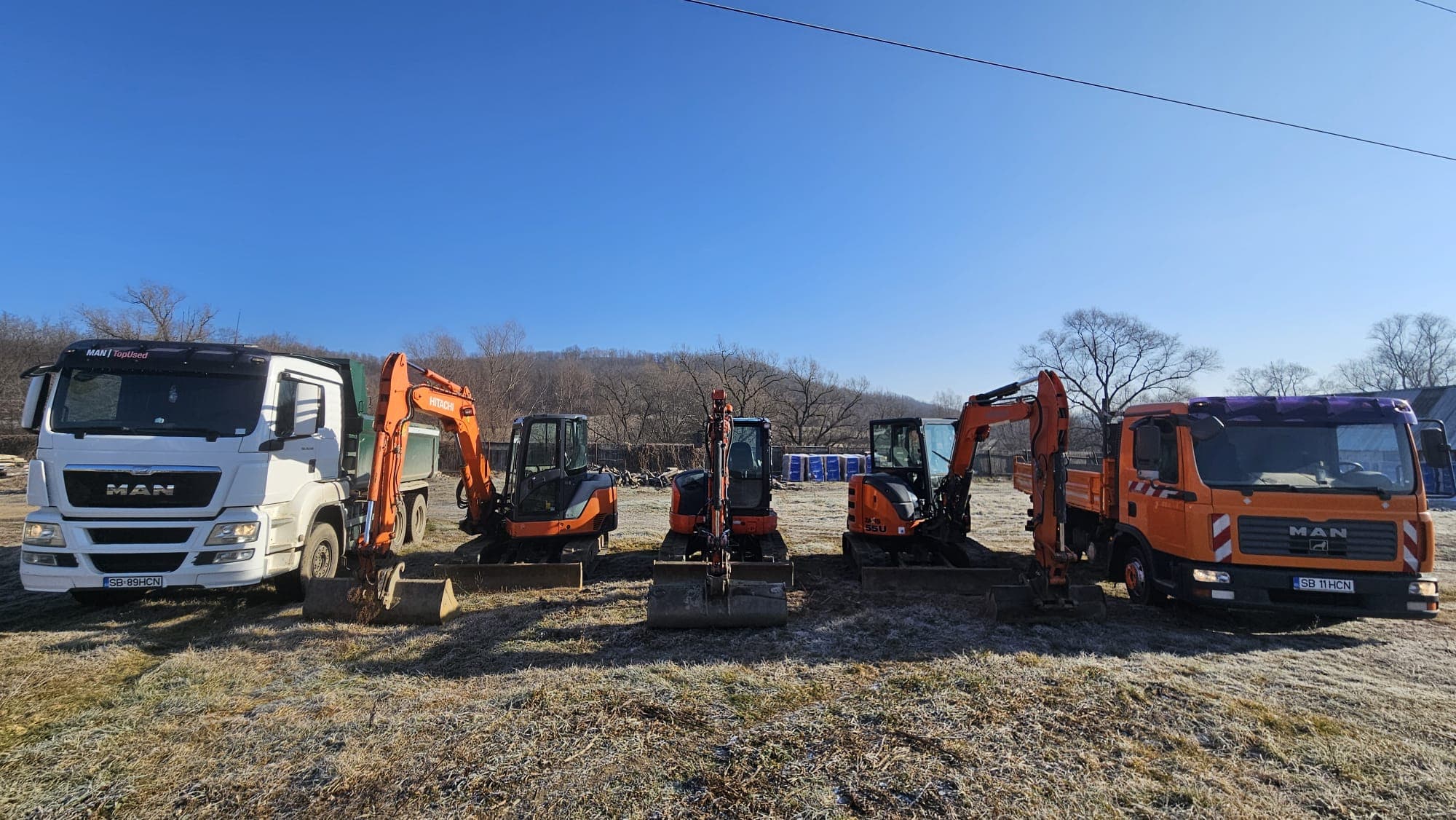 Autobasculantă MAN TGS 26.540 a HCN Construct parcată pe un drum betonat